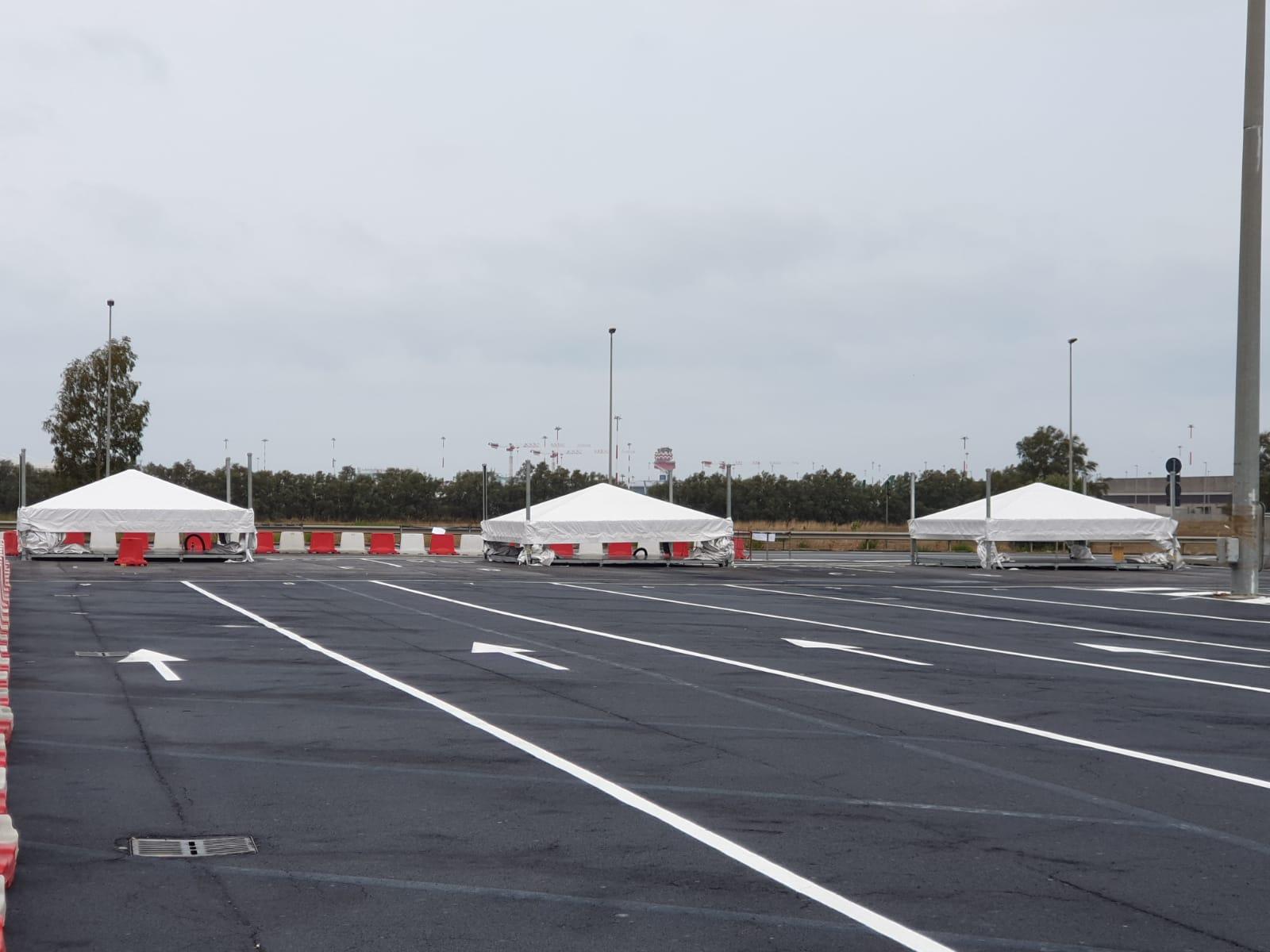 Immagine di sfondo della pagina Adr, drive-in covid 19 a FCO