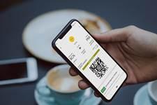 Immagine di sfondo della pagina Vueling e l'assistente virtuale di Google