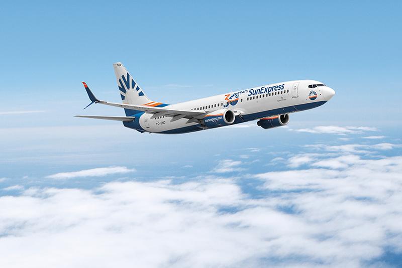 Immagine di sfondo della pagina Sunexpress atterra a Milano