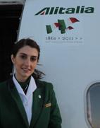 Immagine di sfondo della pagina Alitalia presenta il logo dei 150 anni dell'Unità d'Italia