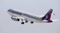 Immagine di sfondo della pagina Qatar Airways entre in oneworld