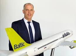 Immagine di sfondo della pagina airBaltic classificata Skytrax COVID-19 a 5 stelle